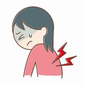 背中に痛みがある女性